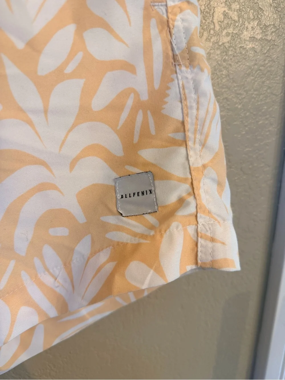 Allfenix men’s yellow Floral swim trunks